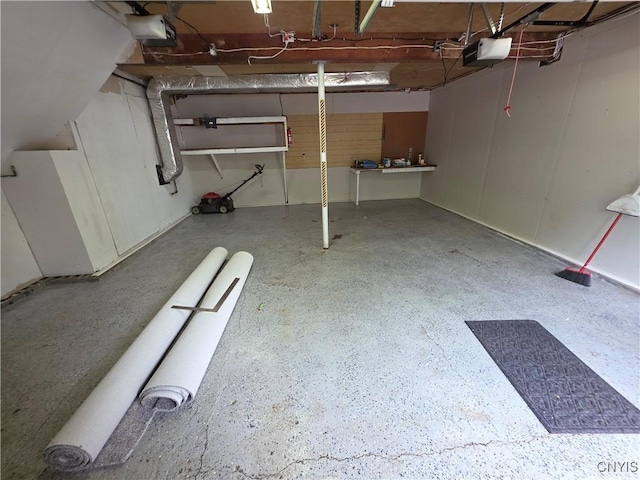 3978 Thrush Ln, Clay, NY 13090 - garage featuring a garage door opener