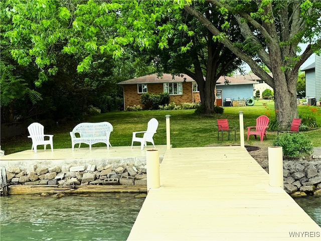 653 S S Colony Rd, Grand Island, NY 14072 - dock area with a yard and a water view