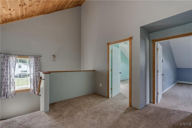 35095 State Route 3, Wilna, NY 13619 - unfurnished room featuring carpet flooring, a baseboard heating unit, high vaulted ceiling, and wood ceiling