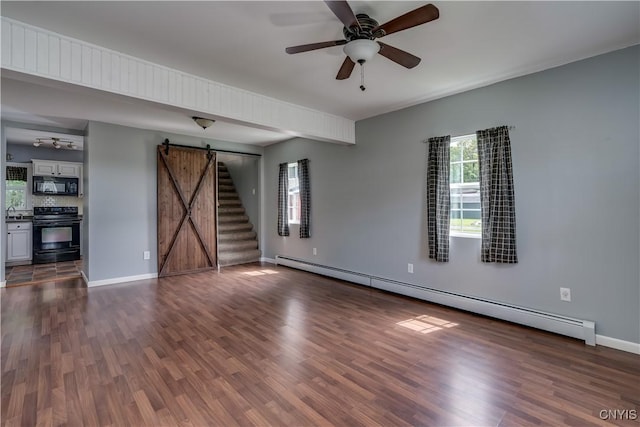 35095 State Route 3, Wilna, NY 13619 - empty room with a barn door, a baseboard heating unit, dark wood finished floors, and a ceiling fan