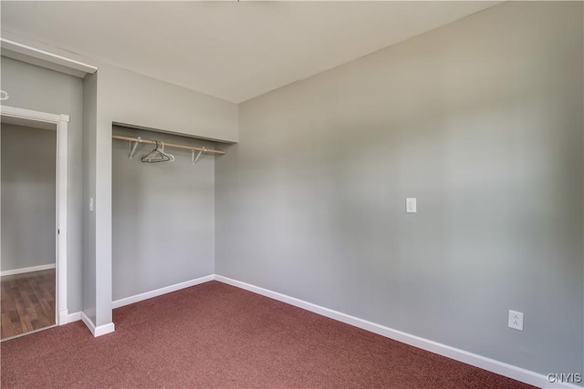 35095 State Route 3, Wilna, NY 13619 - unfurnished bedroom featuring dark colored carpet and a closet