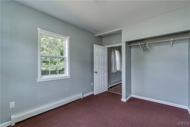 35095 State Route 3, Wilna, NY 13619 - unfurnished bedroom featuring a baseboard heating unit and dark colored carpet