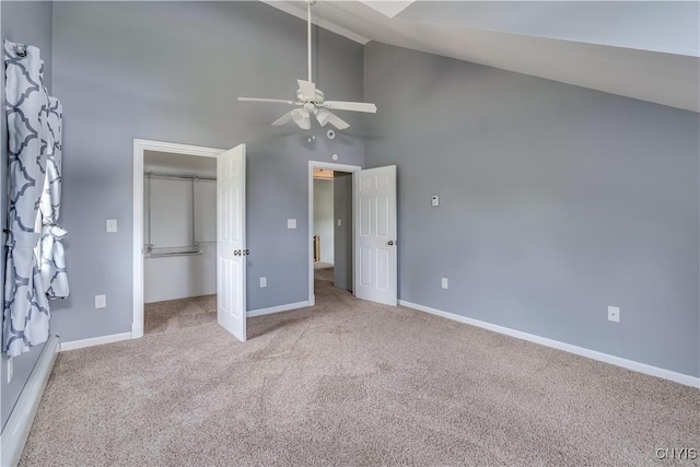 35095 State Route 3, Wilna, NY 13619 - unfurnished bedroom featuring carpet, high vaulted ceiling, a spacious closet, and a ceiling fan