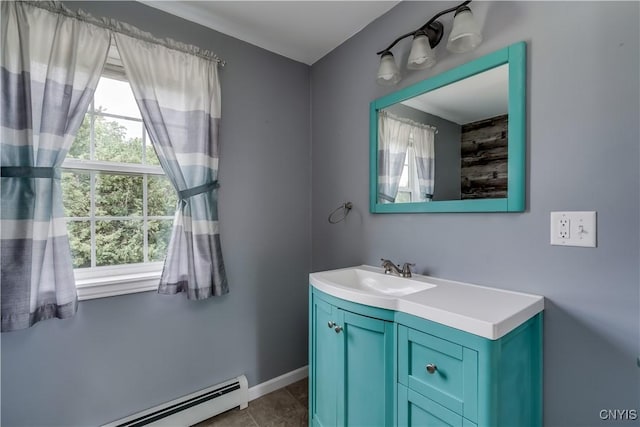 35095 State Route 3, Wilna, NY 13619 - bathroom with baseboard heating, vanity, plenty of natural light, and tile patterned flooring