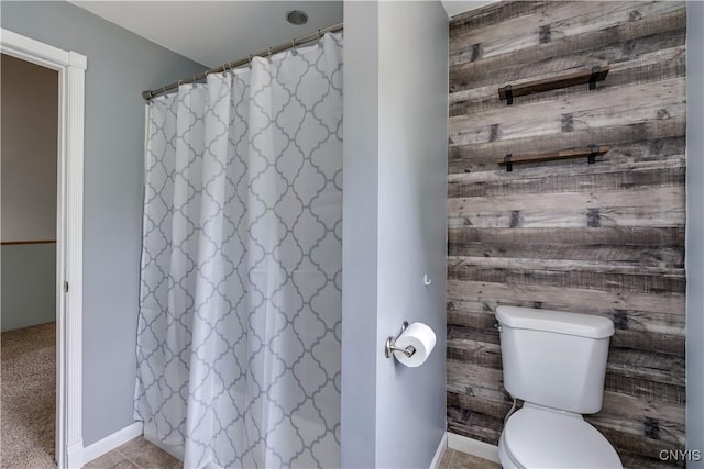 35095 State Route 3, Wilna, NY 13619 - bathroom featuring wooden walls and a shower with shower curtain