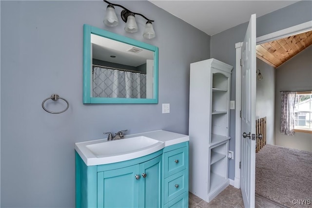 35095 State Route 3, Wilna, NY 13619 - full bath with vanity, wooden ceiling, and vaulted ceiling