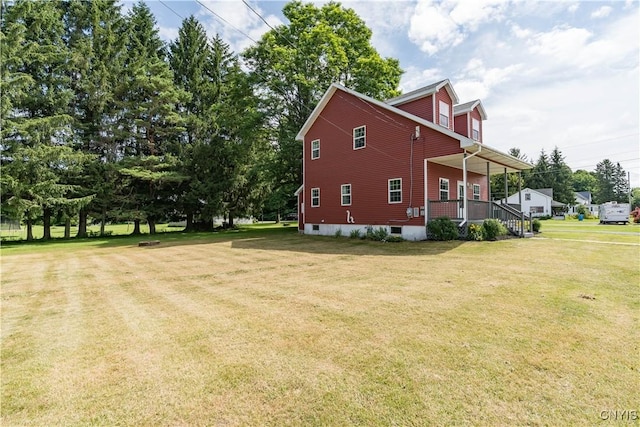 35095 State Route 3, Wilna, NY 13619 - view of property exterior featuring a lawn and a porch