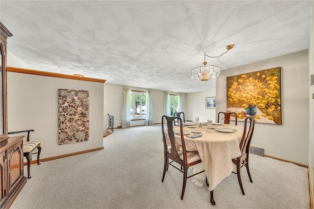 129 Patrice, Amherst, NY 14221 - dining room featuring carpet floors and a chandelier