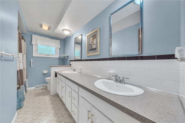 129 Patrice, Amherst, NY 14221 - full bath with double vanity and a shower with shower curtain