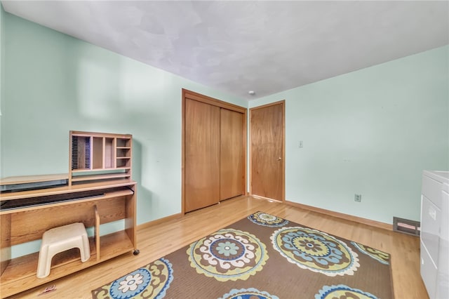 129 Patrice, Amherst, NY 14221 - office area with wood finished floors and washer and clothes dryer