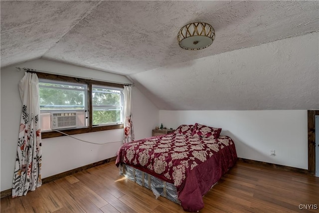 13051 State Route 3, Hounsfield, NY 13685 - bedroom with lofted ceiling, a textured ceiling, cooling unit, and wood finished floors