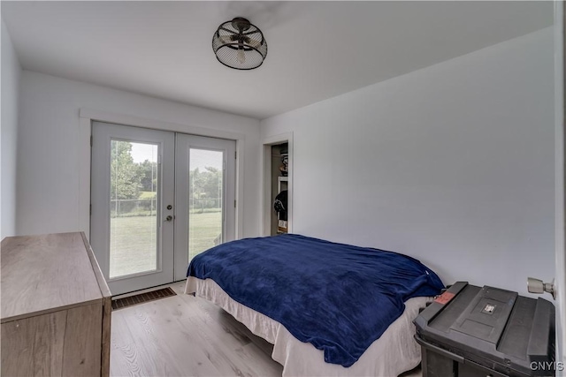 13051 State Route 3, Hounsfield, NY 13685 - bedroom featuring french doors, access to outside, and wood finished floors