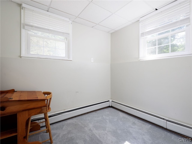 14496 Military Rd, Hounsfield, NY 13685 - empty room with carpet, healthy amount of natural light, a paneled ceiling, and a baseboard heating unit