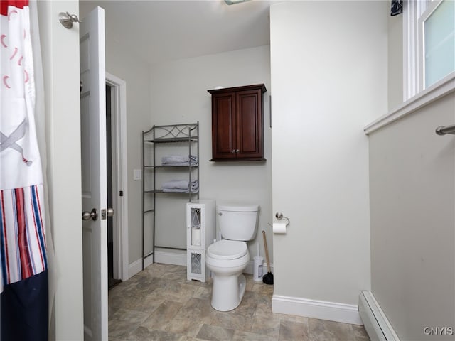 14496 Military Rd, Hounsfield, NY 13685 - bathroom featuring a baseboard heating unit and stone finish flooring