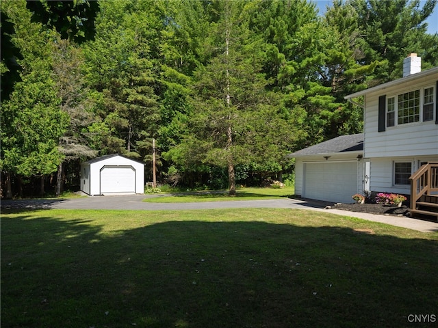 14496 Military Rd, Hounsfield, NY 13685 - view of grassy yard with an outdoor structure and driveway