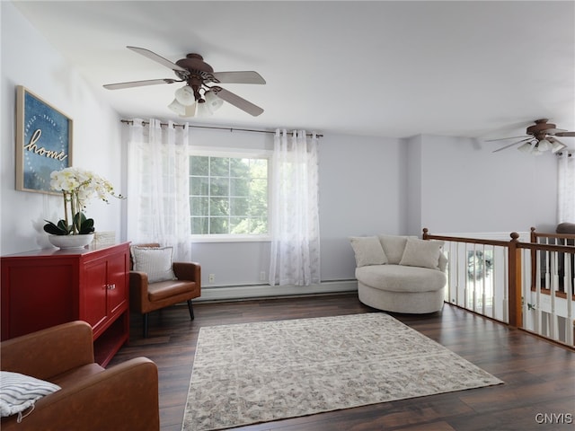 14496 Military Rd, Hounsfield, NY 13685 - sitting room with ceiling fan, a baseboard radiator, and dark wood finished floors