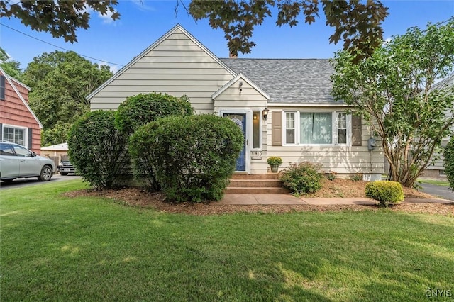 419 Bronson Rd, Geddes, NY 13219 - view of front of property with roof with shingles and a front yard