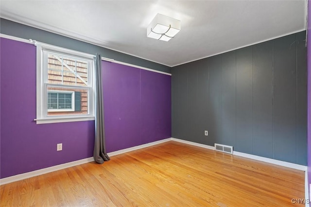 419 Bronson Rd, Geddes, NY 13219 - spare room with wood finished floors and baseboards