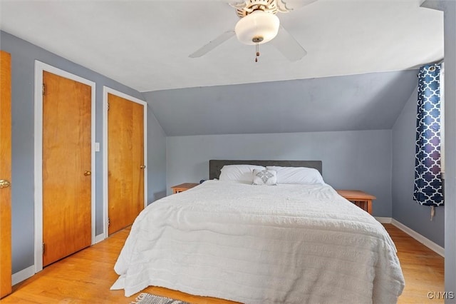 419 Bronson Rd, Geddes, NY 13219 - bedroom featuring light wood-style floors, vaulted ceiling, and ceiling fan