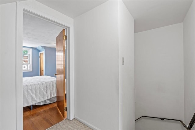 419 Bronson Rd, Geddes, NY 13219 - hall with baseboards and carpet flooring