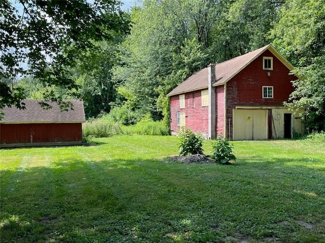 10276 Roosevelt Hwy, Yates, NY 14098 - view of grassy yard with an outbuilding