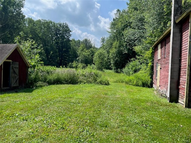 10276 Roosevelt Hwy, Yates, NY 14098 - view of grassy yard with an outbuilding
