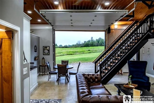 942 Spencer Rd, Kiantone, NY 14701 - living room with finished concrete flooring, wooden ceiling, recessed lighting, stairs, and a view of countryside
