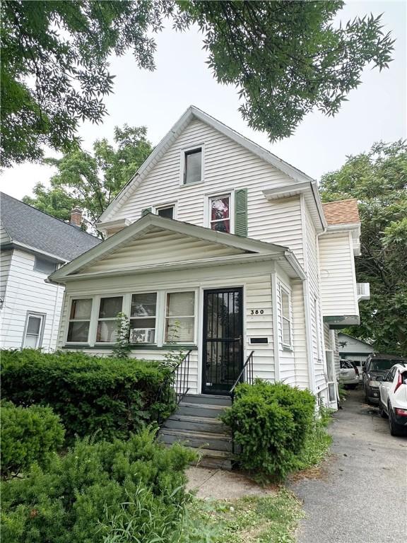 380 Sawyer St, Rochester, NY 14619 - view of front facade featuring entry steps and asphalt driveway