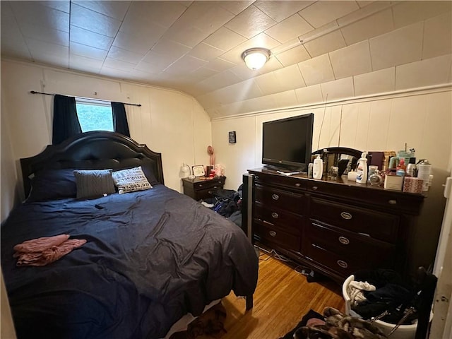 380 Sawyer St, Rochester, NY 14619 - bedroom with light wood-style flooring and vaulted ceiling