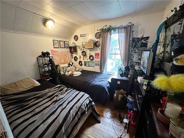 380 Sawyer St, Rochester, NY 14619 - bedroom with wood finished floors, lofted ceiling, and crown molding