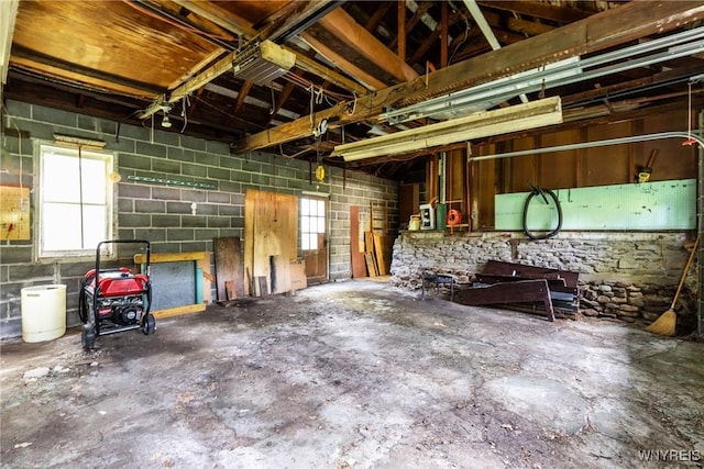 2458 Hess Rd, Newfane, NY 14008 - garage featuring concrete block wall