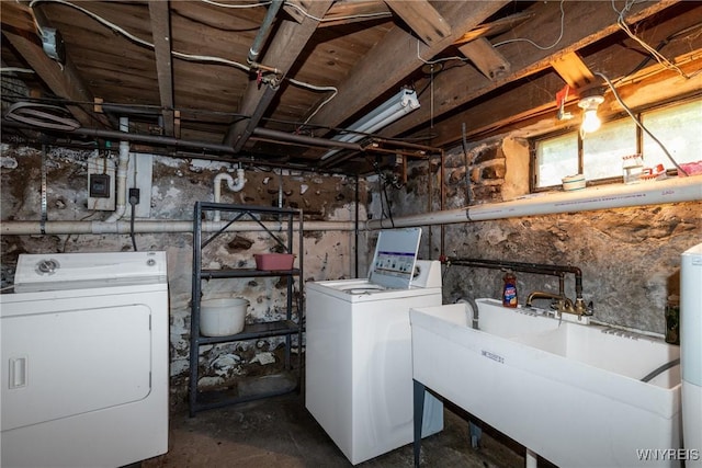 2458 Hess Rd, Newfane, NY 14008 - unfinished basement featuring washing machine and dryer and a sink