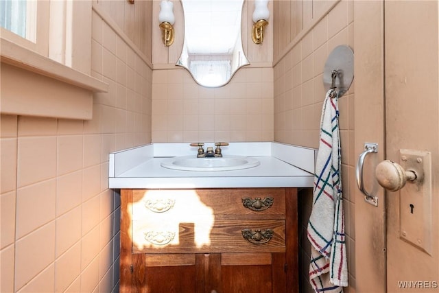2458 Hess Rd, Newfane, NY 14008 - bathroom with tile walls and vanity