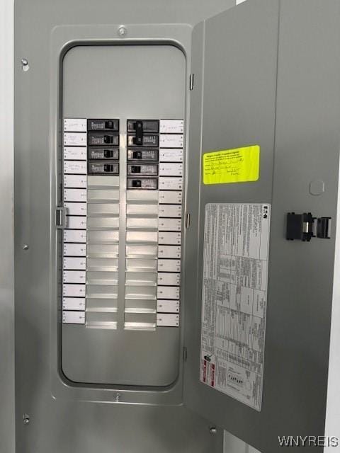 454 Campus Dr, Amherst, NY 14226 - utility room featuring electric panel