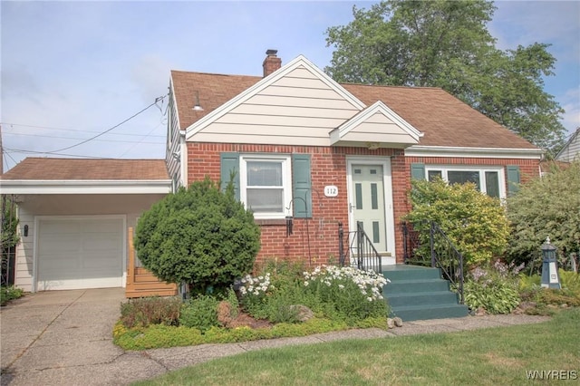 112 Vegola Ave, Cheektowaga, NY 14225 - bungalow-style house with brick siding, a chimney, concrete driveway, and a shingled roof