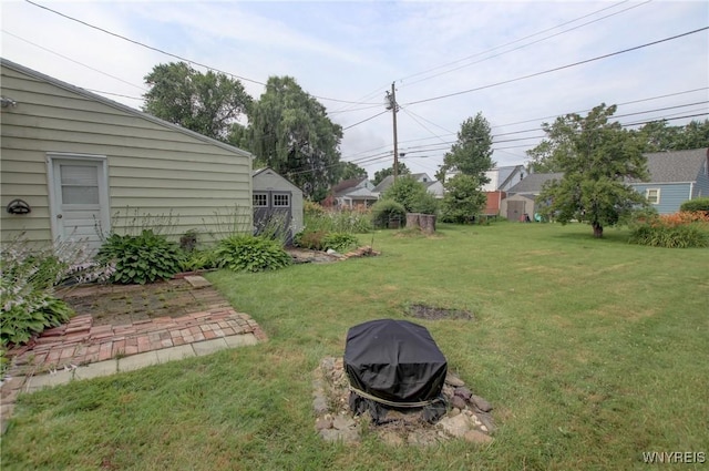 112 Vegola Ave, Cheektowaga, NY 14225 - view of green lawn featuring an outdoor structure