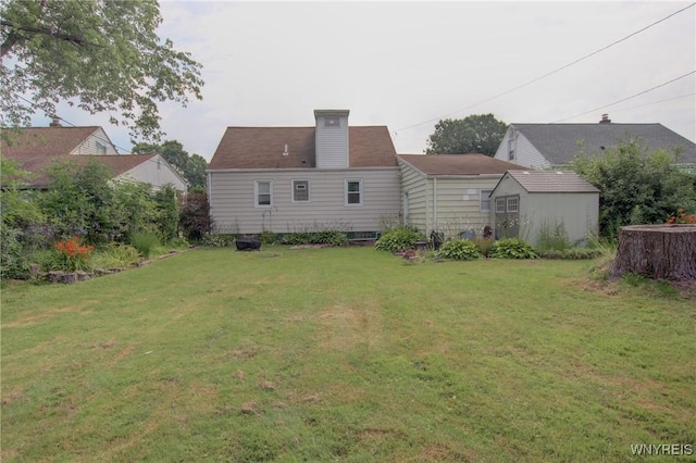112 Vegola Ave, Cheektowaga, NY 14225 - rear view of property featuring a chimney and a lawn