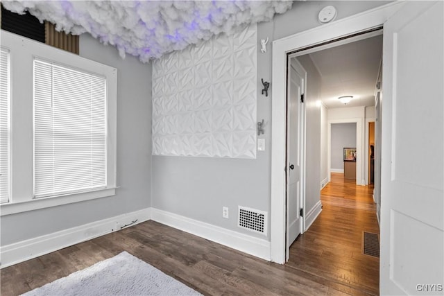 423 Highland Ave, Dewitt, NY 13057 - corridor featuring dark wood-style floors and baseboards