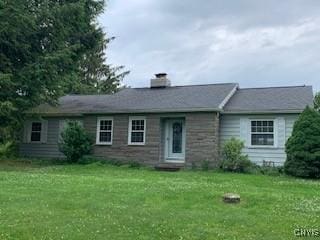884 Kibby Rd, Lysander, NY 13027 - view of front of home with a front yard and a chimney
