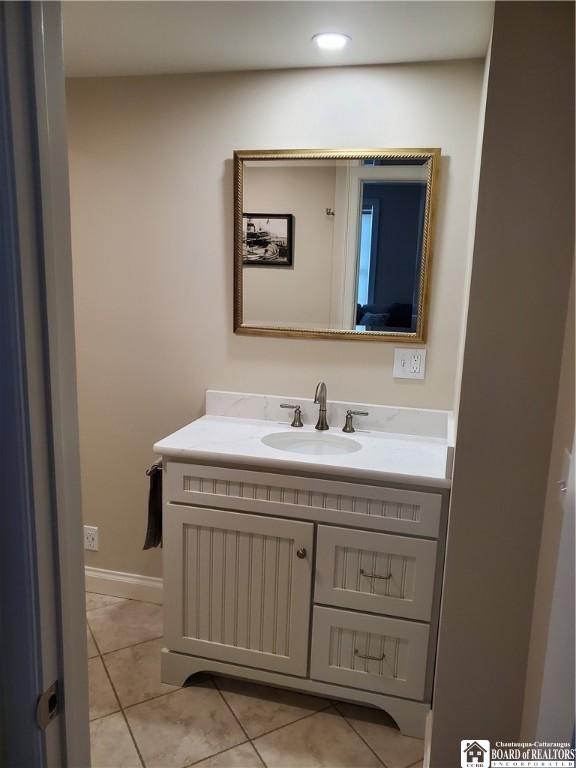 37 Center St, Ellery, NY 14712 - bathroom featuring vanity and tile patterned flooring