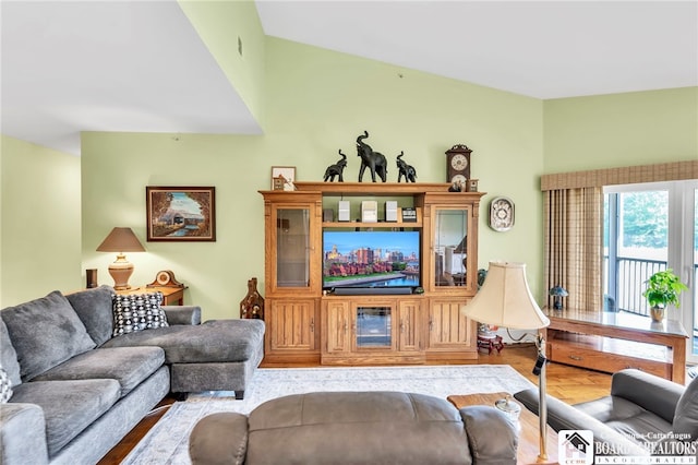 743 Legacy Dr Unit 209, Lewiston, NY 14092 - living room with wood finished floors