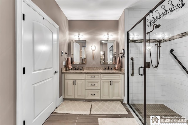 743 Legacy Dr Unit 209, Lewiston, NY 14092 - full bathroom with double vanity, a stall shower, and wood finished floors