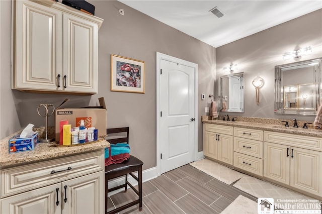 743 Legacy Dr Unit 209, Lewiston, NY 14092 - full bath with double vanity and baseboards
