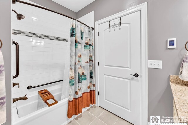 743 Legacy Dr Unit 209, Lewiston, NY 14092 - full bath with shower / bath combo with shower curtain, tile patterned floors, and vanity