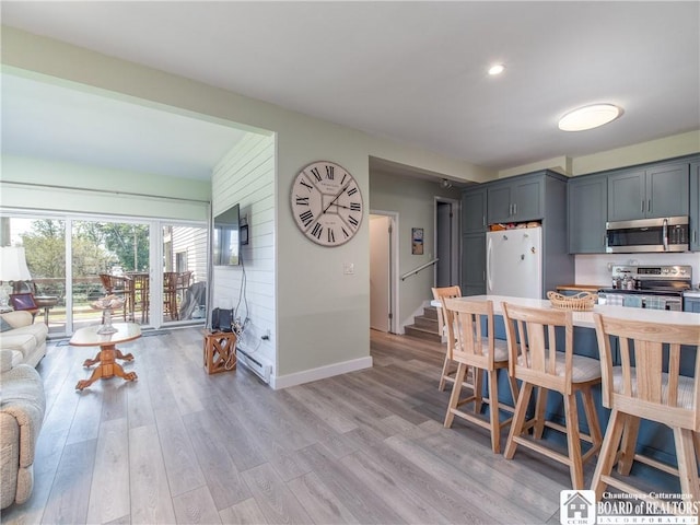 5301 E Lake Rd Unit 23, Chautauqua, NY 14728 - kitchen with stainless steel appliances, light wood-style flooring, and recessed lighting