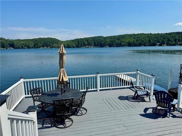 3018 Camp Rd, Eaton, NY 13334 - dock with a forest view, a deck with water view, and outdoor dining space