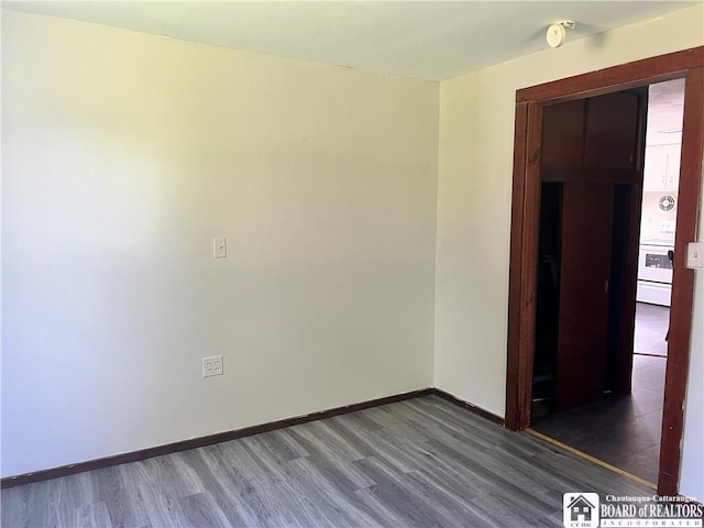70 Williams Ave, Wellsville, NY 14895 - spare room with wood finished floors and baseboards