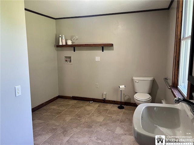 70 Williams Ave, Wellsville, NY 14895 - bathroom featuring ornamental molding