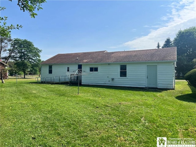 70 Williams Ave, Wellsville, NY 14895 - back of property with a yard