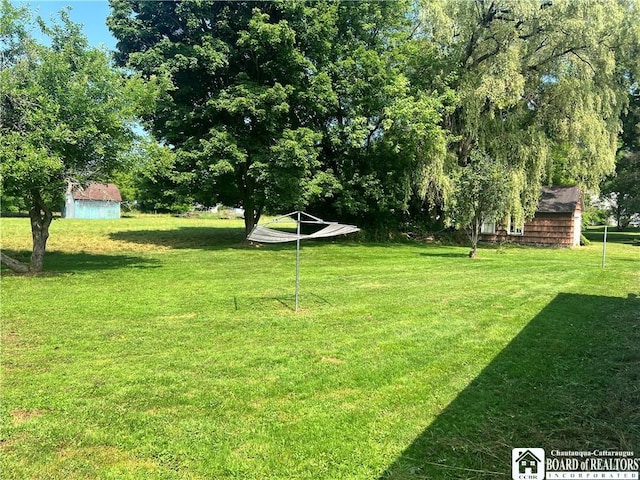 70 Williams Ave, Wellsville, NY 14895 - view of green lawn with view of scattered trees